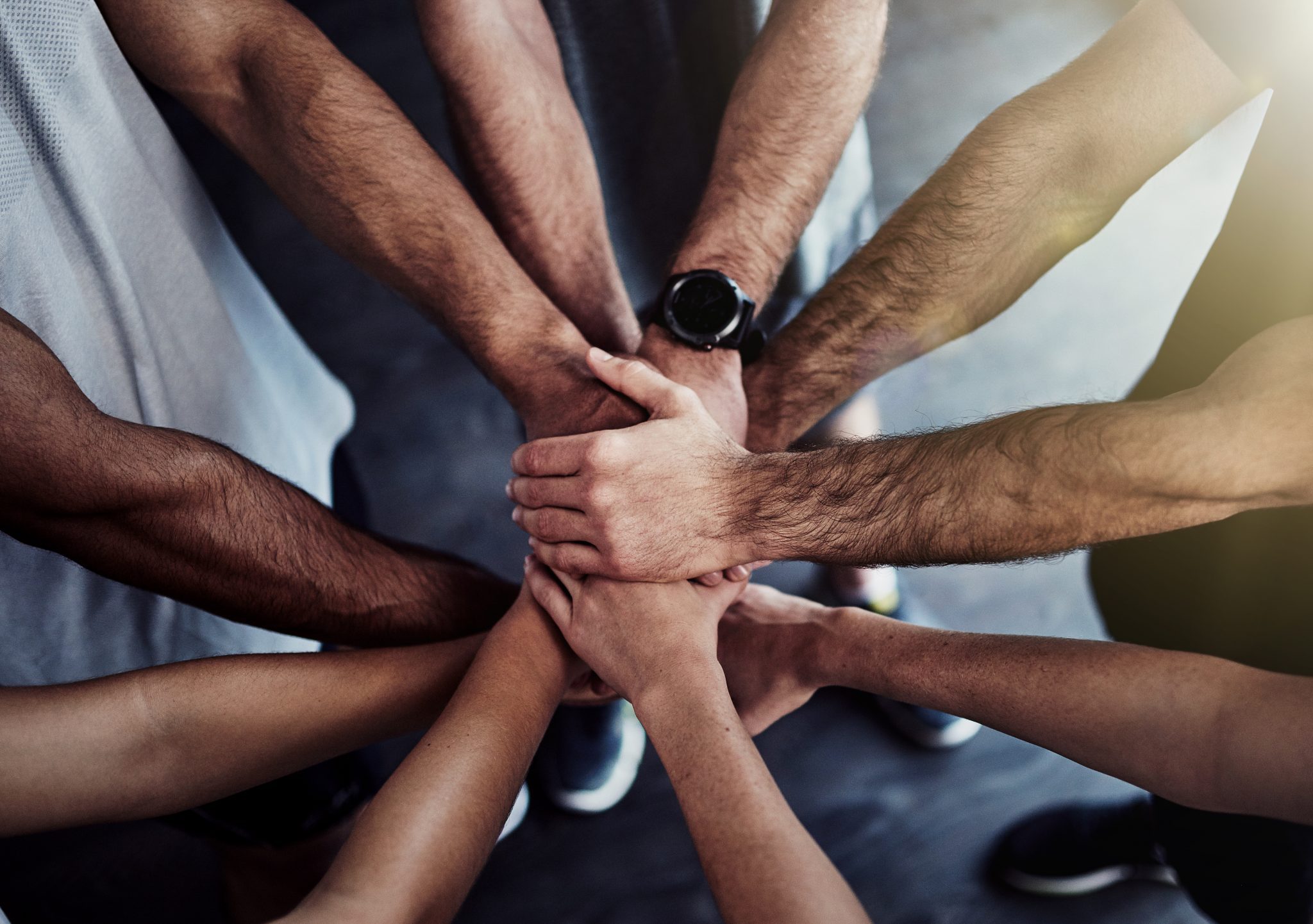 group_men_hands